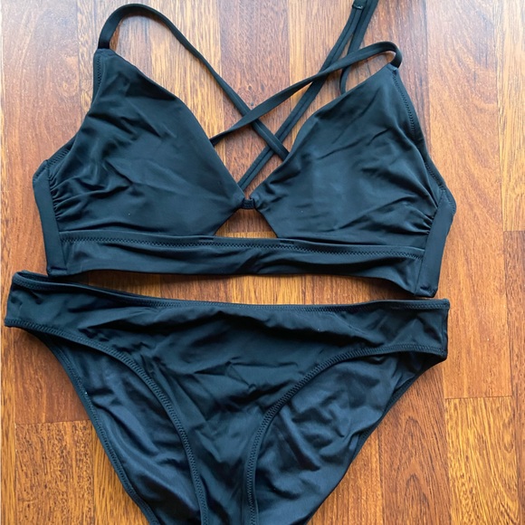 One piece bathing suit from Target as well as 2 pice suit from Target. - Picture 3 of 3